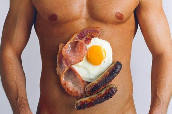 Woman drinking water to relieve acid reflux